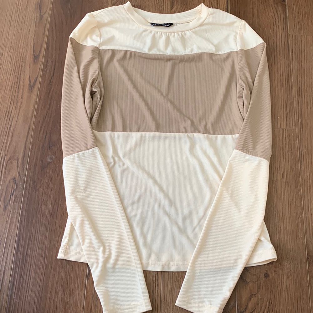 Tight fitting long sleeve top